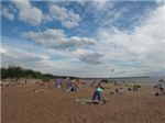 Еще один вид пляжа.. Серфы, кайты, небо, море, облака, песок, отдыхающие....
